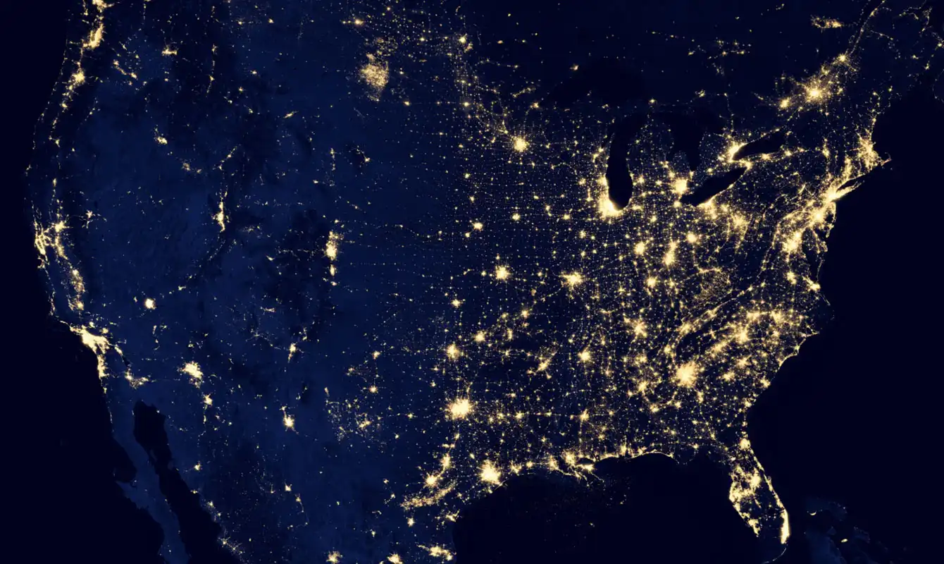 Satellite night view of United States showing off major inhabited zones